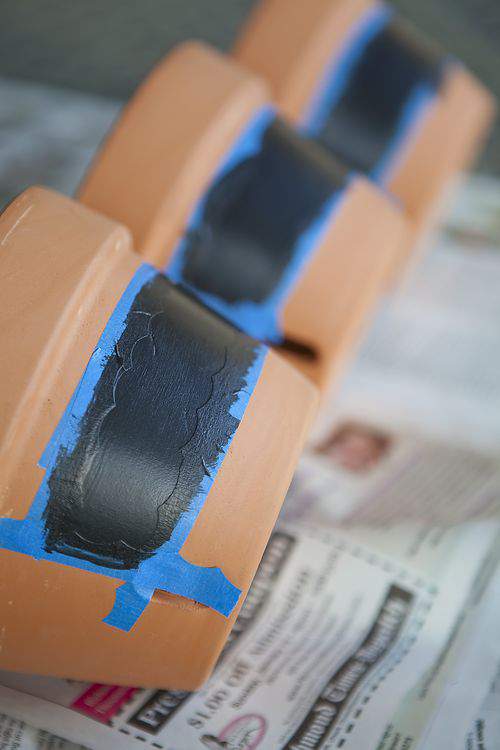 terra cotta pots and chalkboard paint