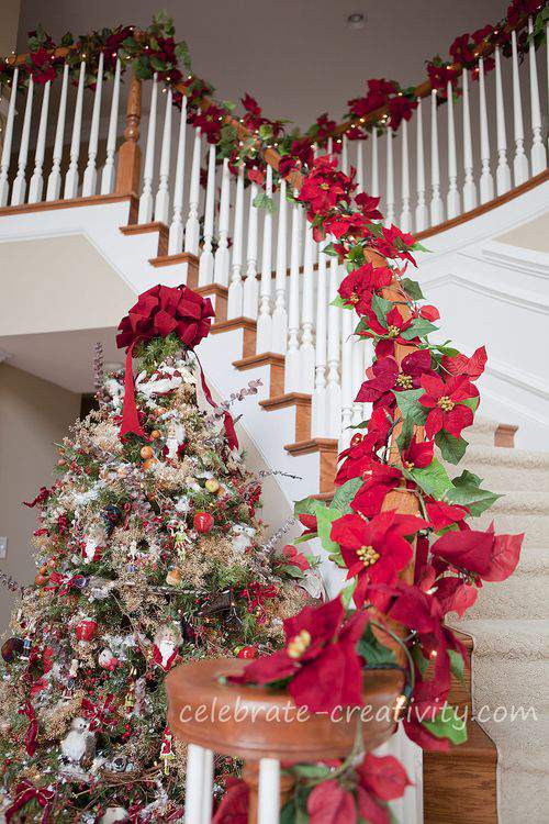 tree and poinsettia staircase