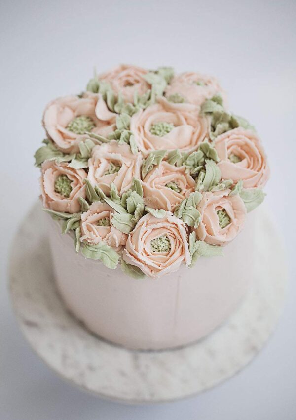 cake with buttercream peonies